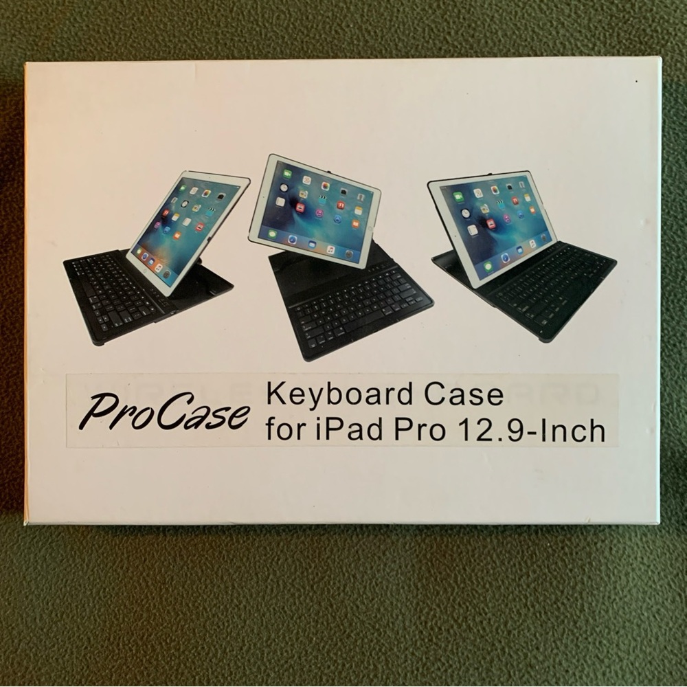 FUC ProCase keyboard case for iPad Pro 12.9”. Black and silver. Charging cord.